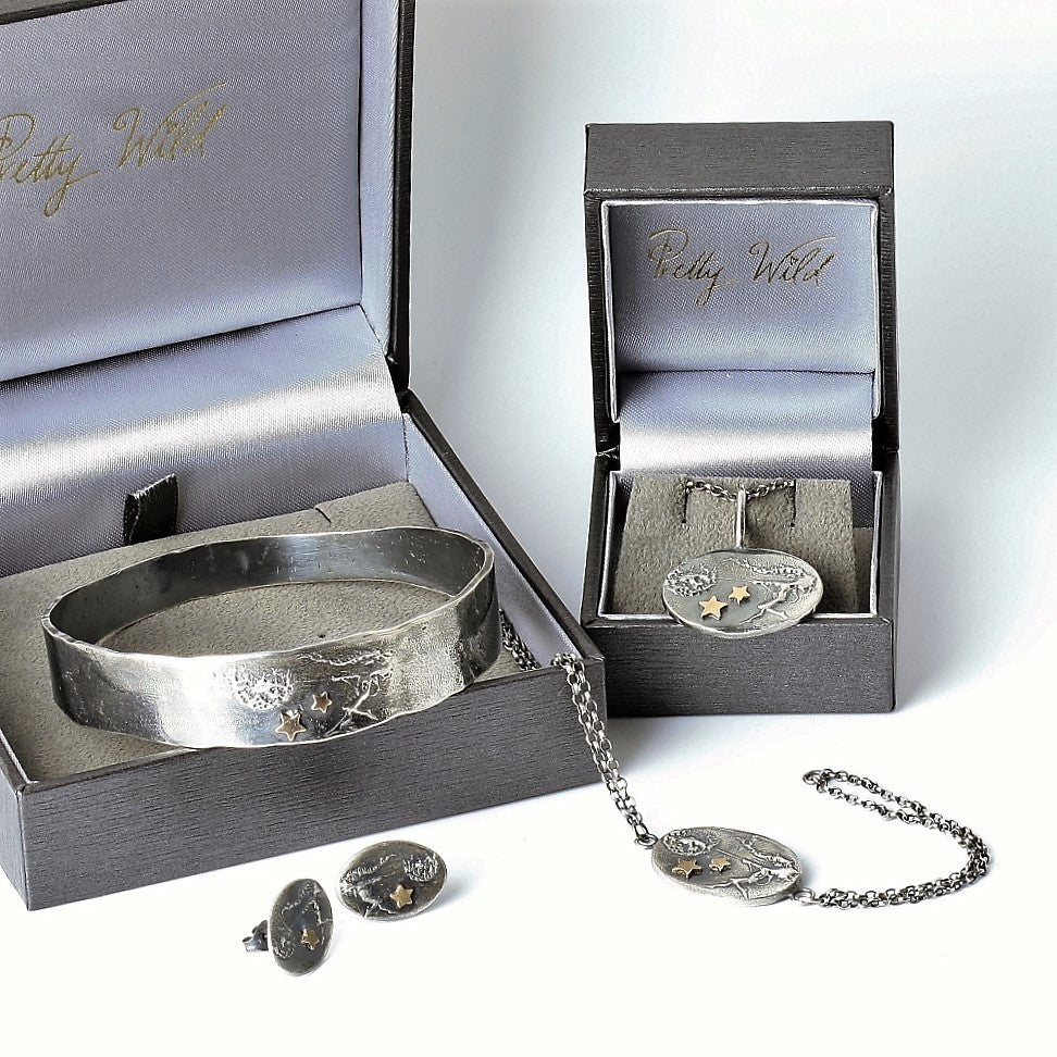 handmade silver and gold contemporary fairy bangle with gold stars