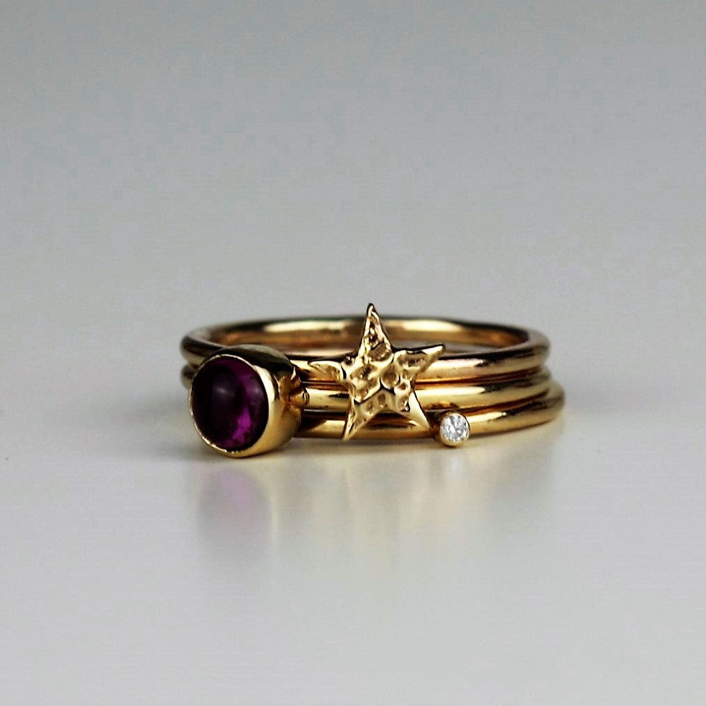 Diamond textured gold star and tourmaline midi stacking rings