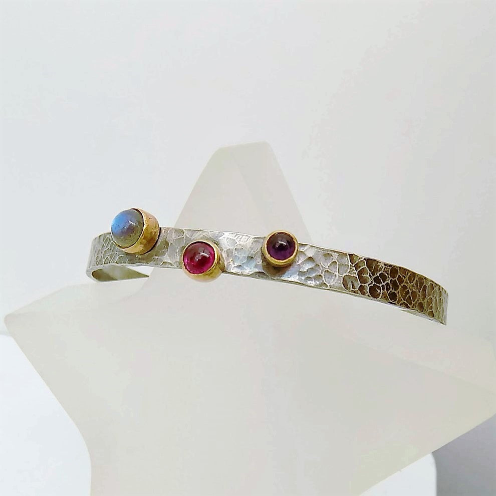 sterling silver handmade rustic blossom bangle with amethyst, pink tourmaline and labradorite bezel set in 9ct gold