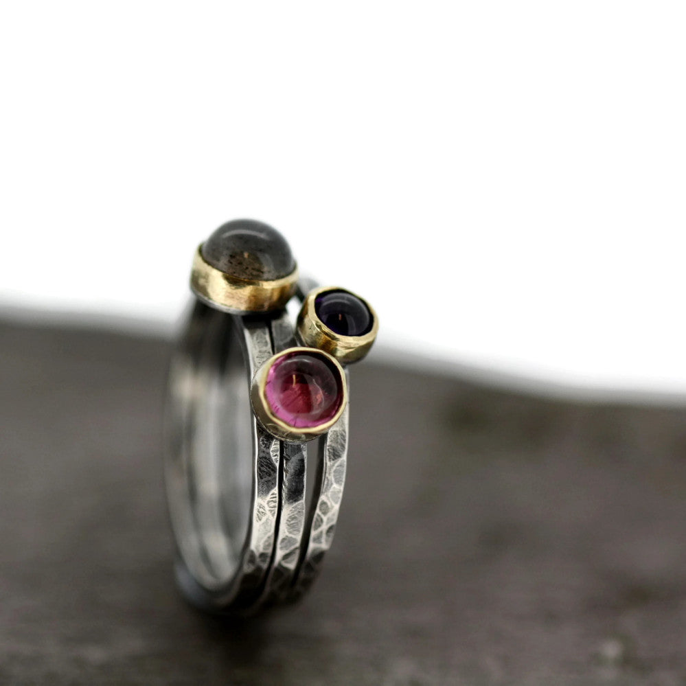 a dreamy set of silver and gold mixed metal blossom rings