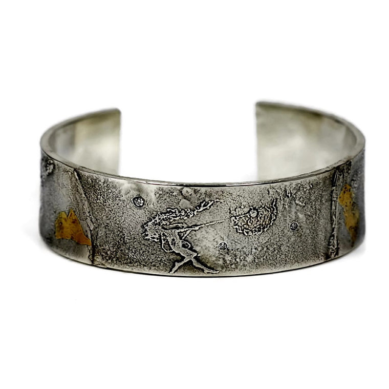 unusual gold and silver fairy cuff dancing with dandelions with diamonds